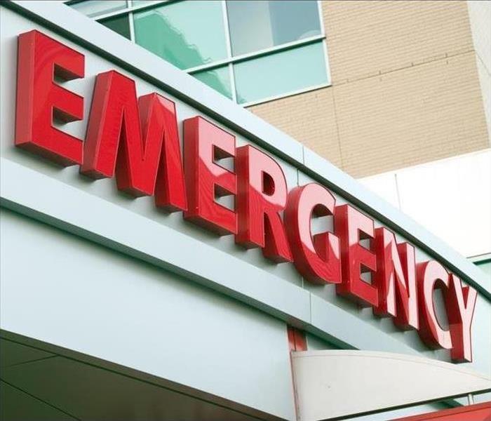 Emergency sign on hospital door