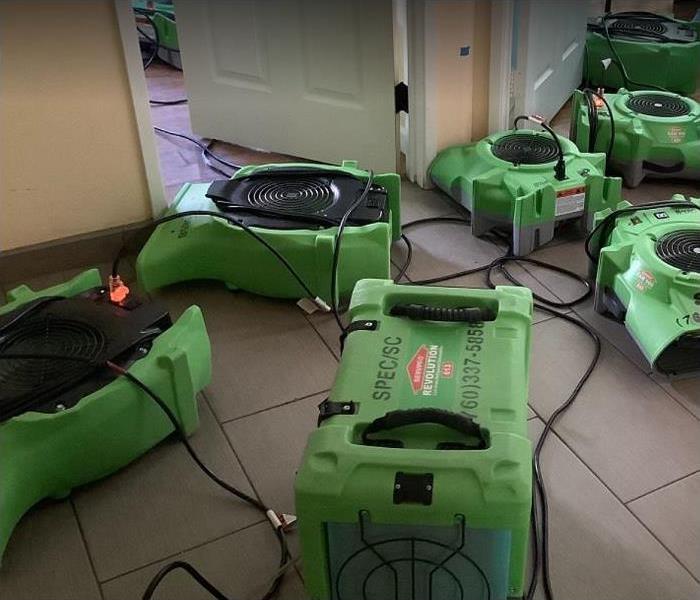 SERVPRO restoration equipment being used in water damaged home