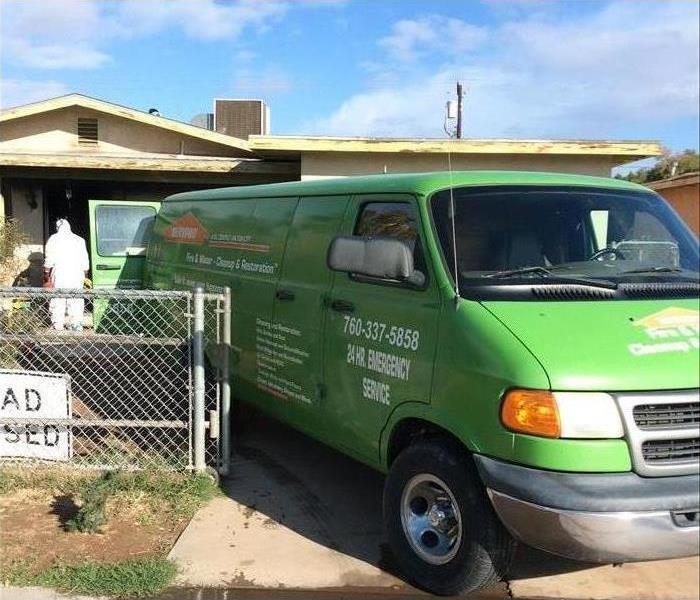 Servpro team working at a house